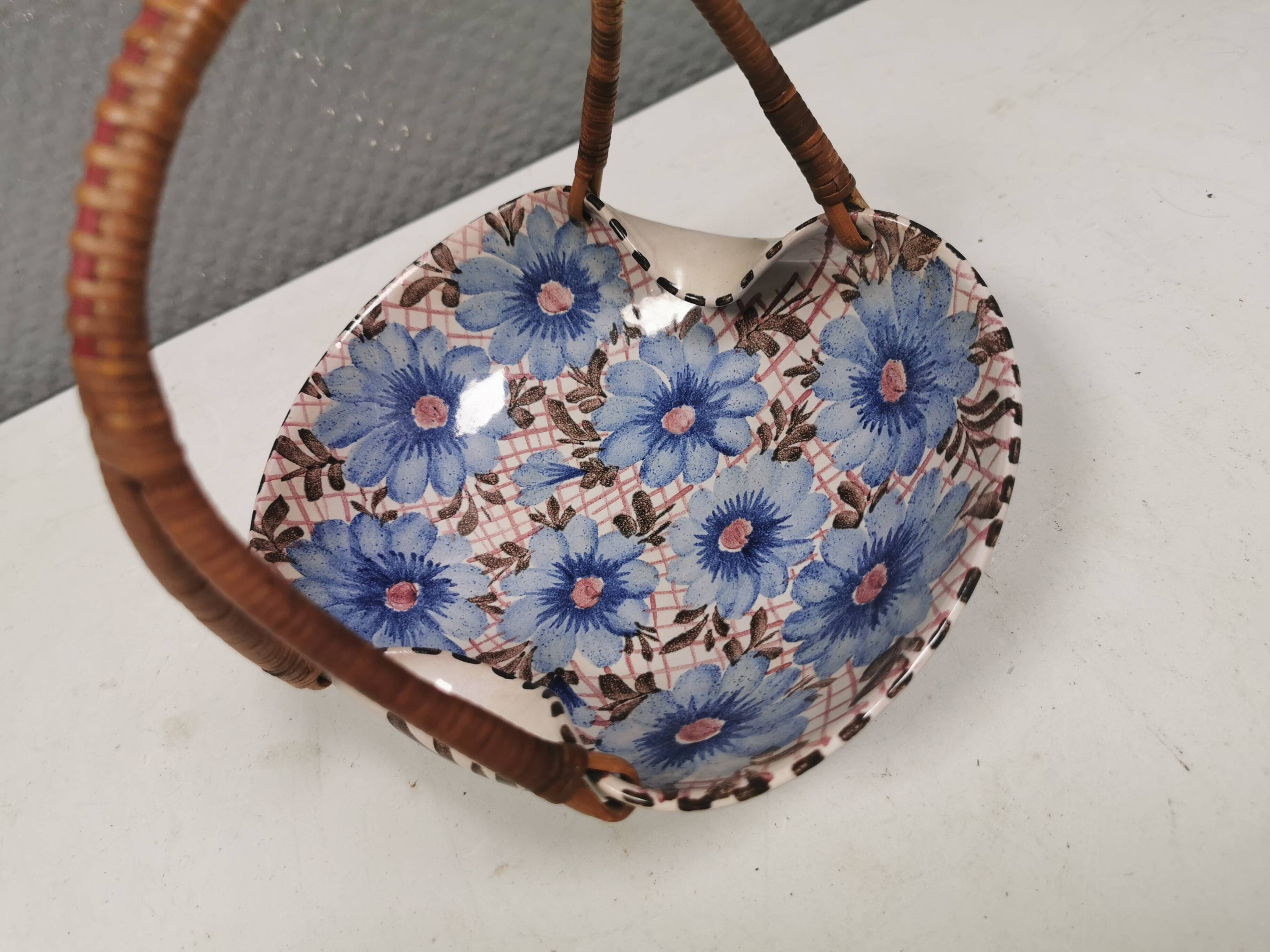 Beautiful small painted ceramic basket with woven handle