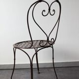 Set of 4 wrought iron chairs.