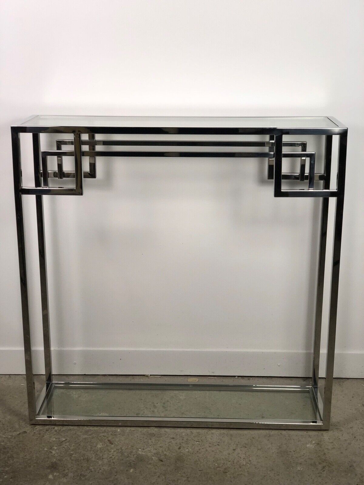 Art Deco style console in chromed metal with glass top