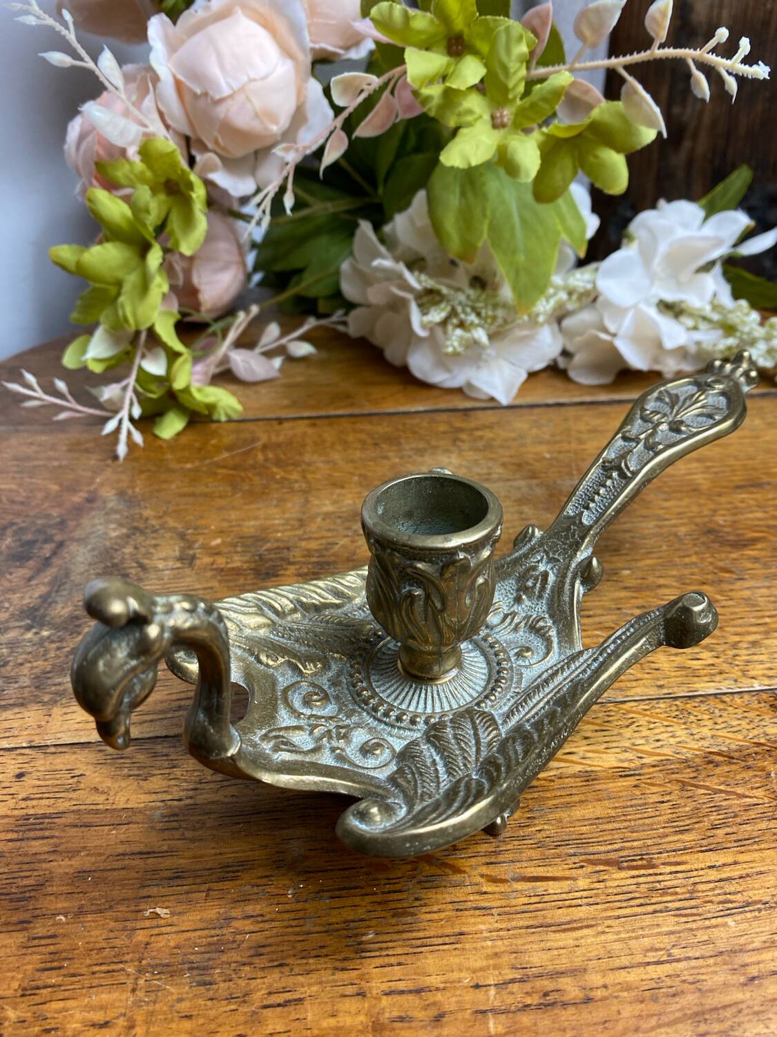 Hand candlestick, peacock shape, in bronze