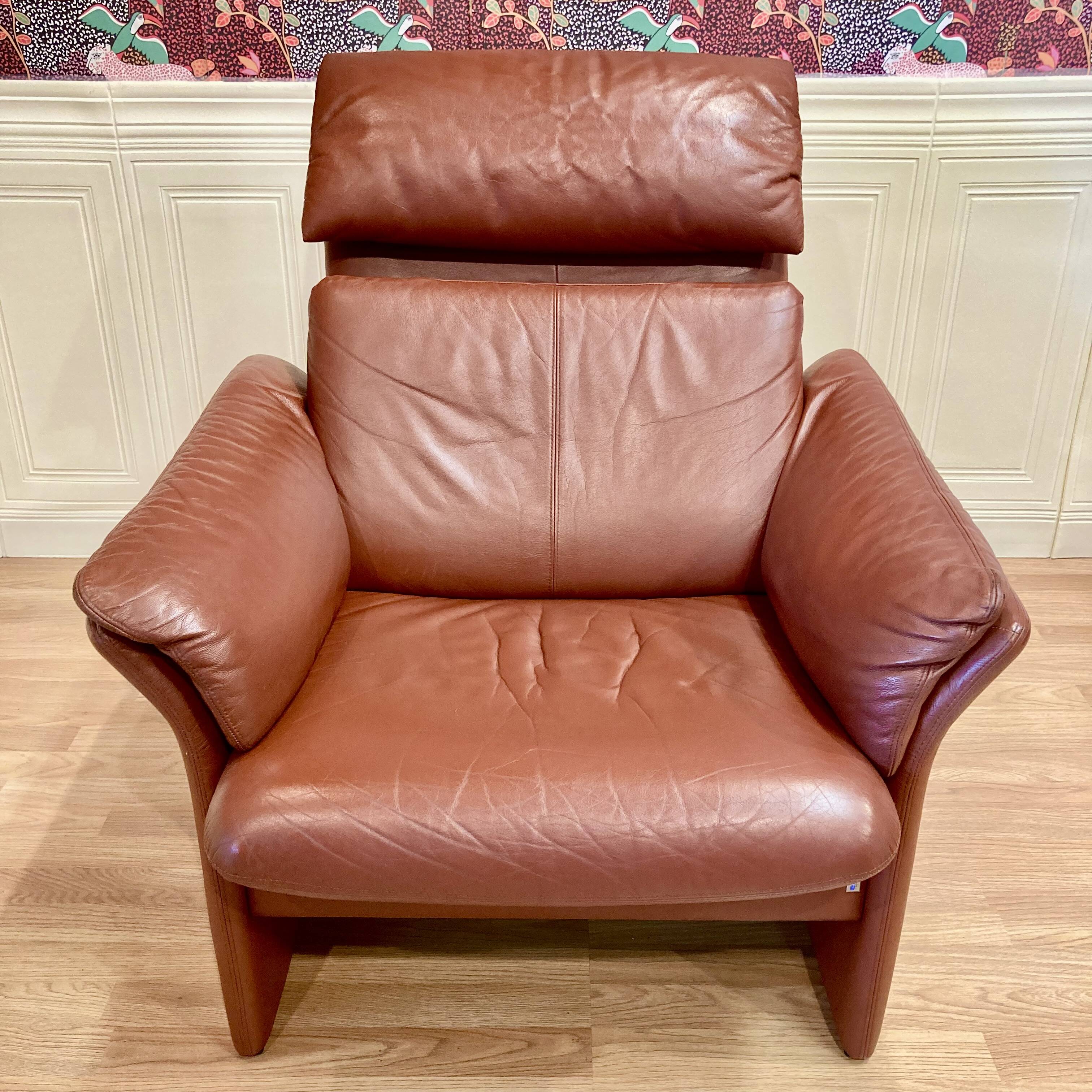 Pair of "Erpo" designer adjustable leather armchairs.