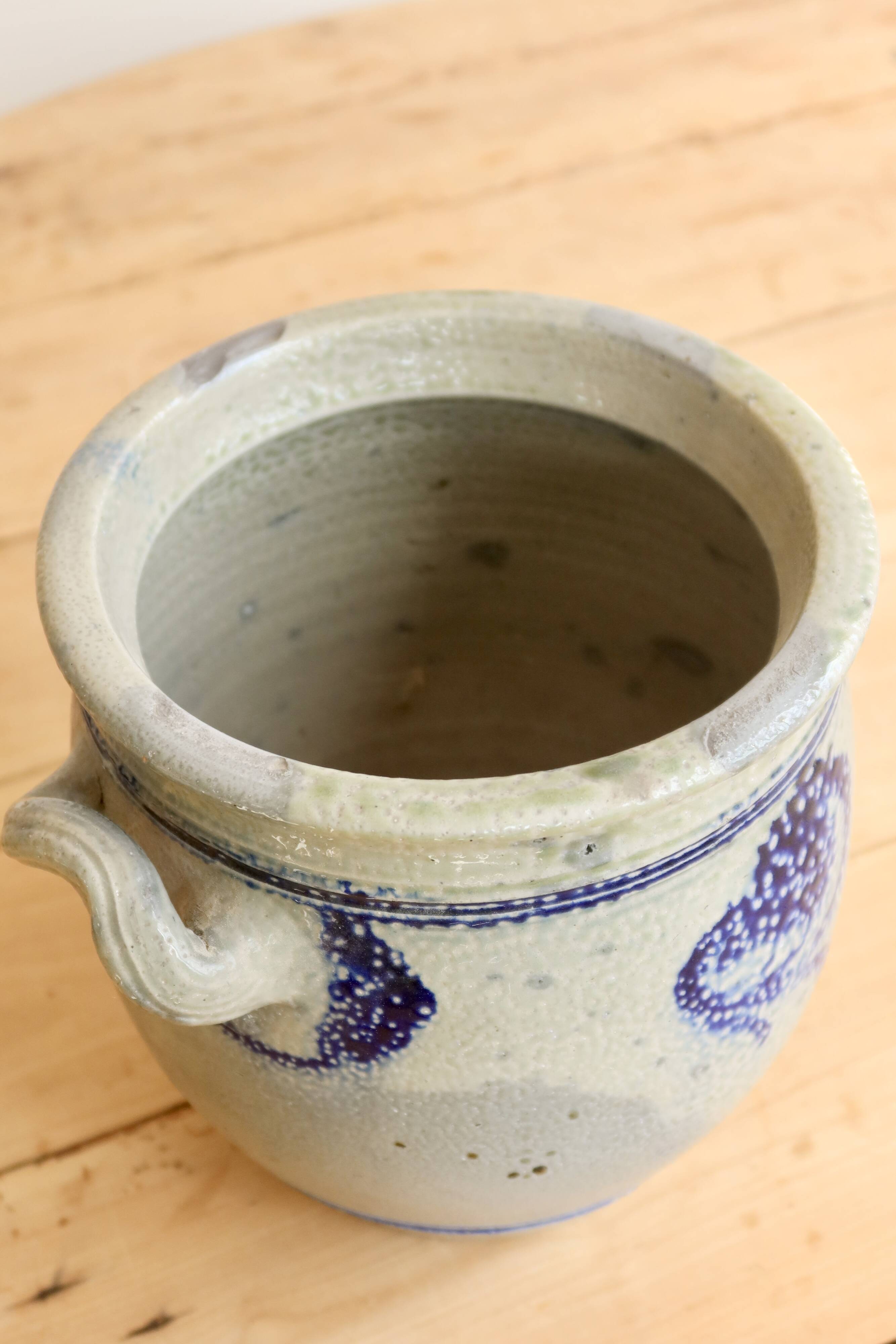 Old ceramic jar from Alsace with blue decoration.