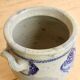 Old ceramic jar from Alsace with blue decoration.