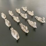 12 metal duck-shaped knife holders
