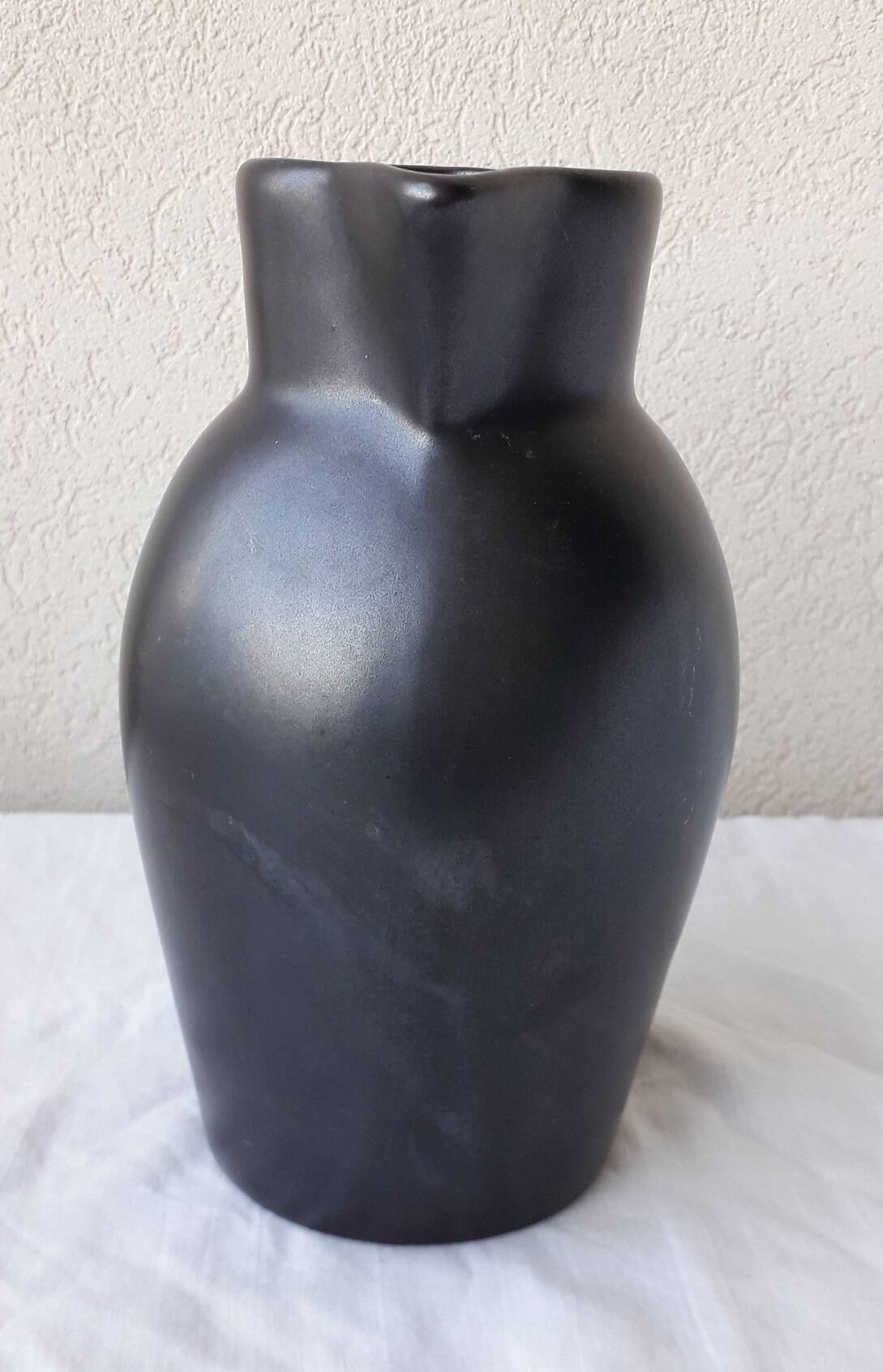 Black ceramic jug