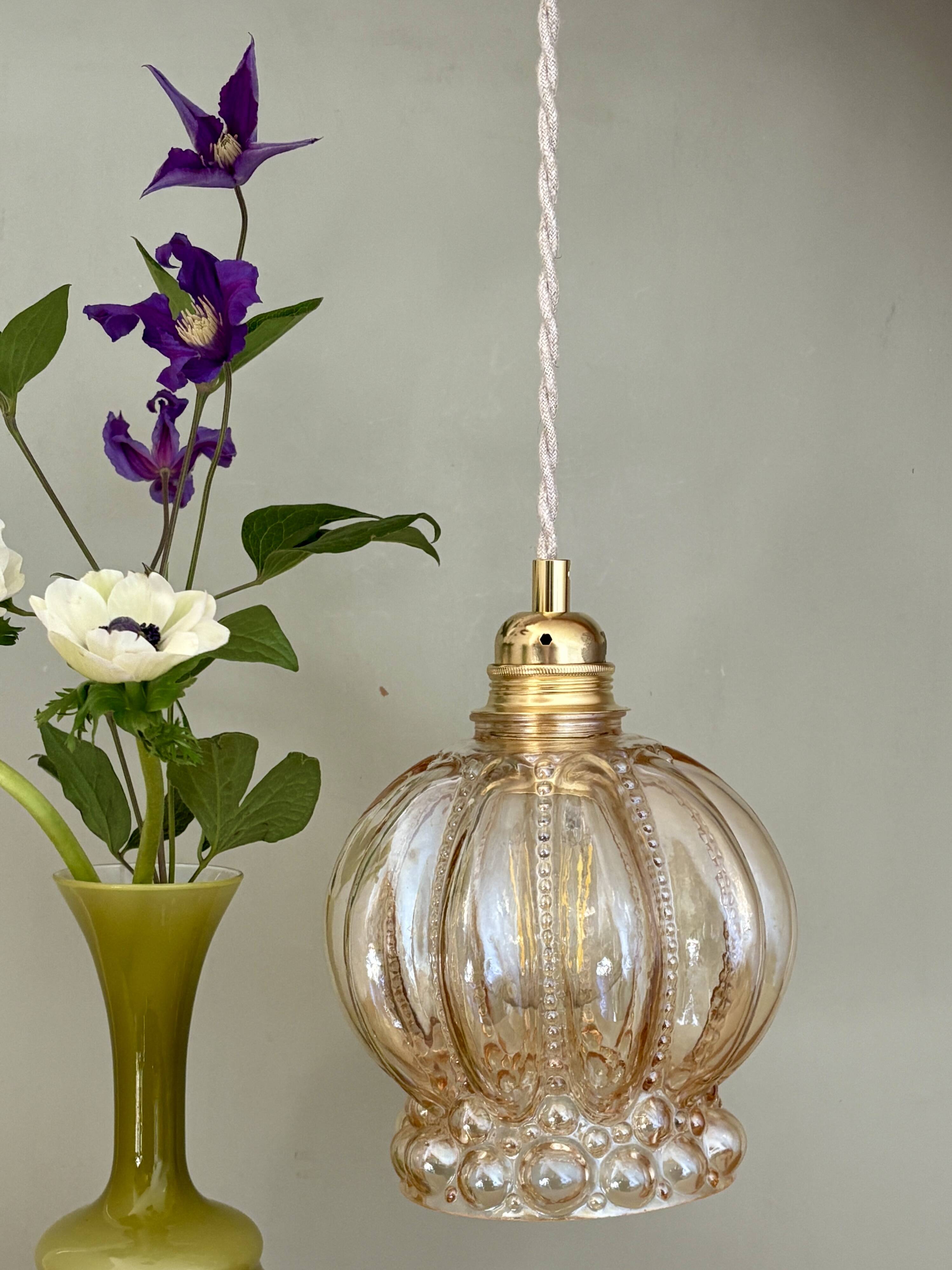 Vintage globe pendant light in amber bubble glass