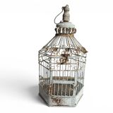 Vintage hexagonal metal birdcage from around 1940.
