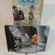 Metal wall-mounted magazine/book rack