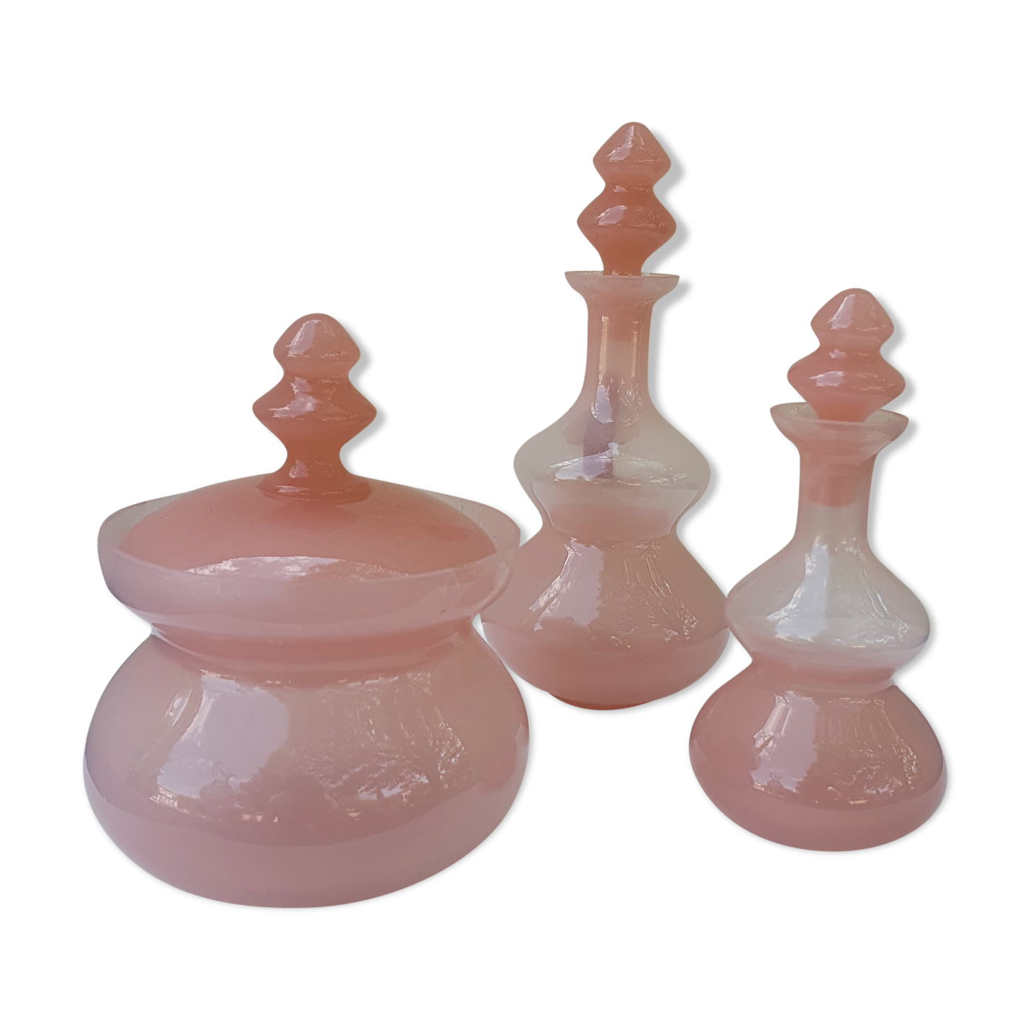 Old bottles in powder pink opaline