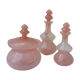 Old bottles in powder pink opaline