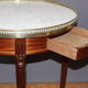 Table bouillotte de style Louis XVI en acajou vers 1920