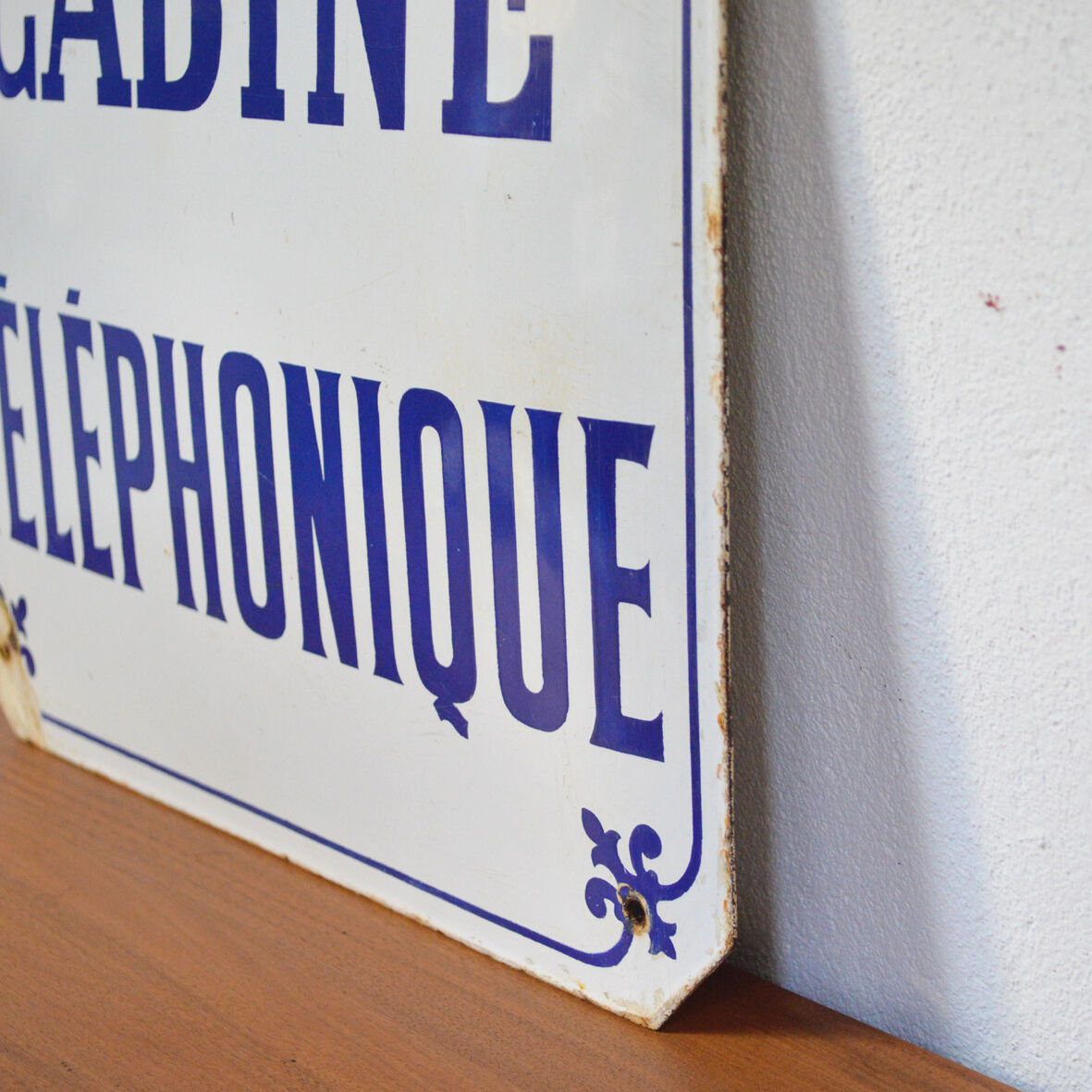 Old phone booth enamelled plate