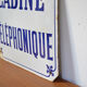 Old phone booth enamelled plate
