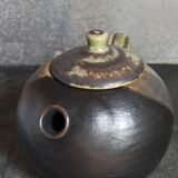 Vintage enameled stoneware potter's teapot