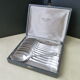 Box of 12 teaspoons in silver metal