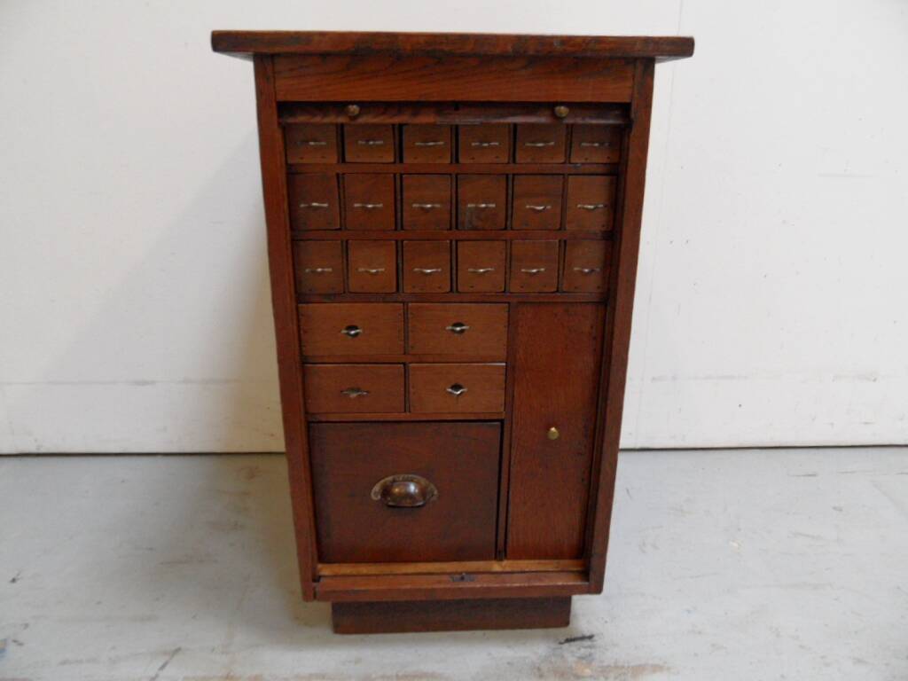 Antique watchmakers cabinet with drawers