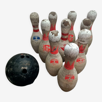 Old set of 10 bowling pins with ball