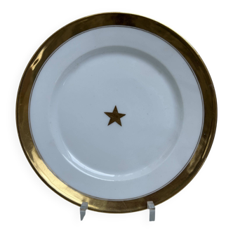 Assiettes en porcelaine de bruxelles. bord dorée et étoile dorée au centre.