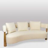 “Bean” shaped 3-seater sofa, in blond beech. Contemporary work
