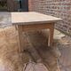 Table basse en hêtre brut