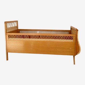 Baby bed from the 50s in wicker and wood