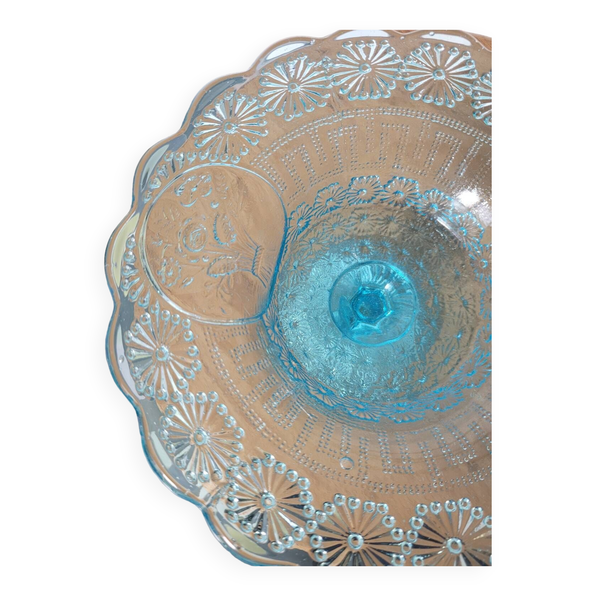 Plate on blue glass pedestal