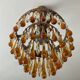 Vintage chandeliers with amber glass tassels and drops