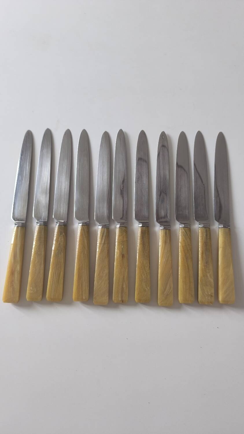 Set of 12 bakelite and stainless steel knives