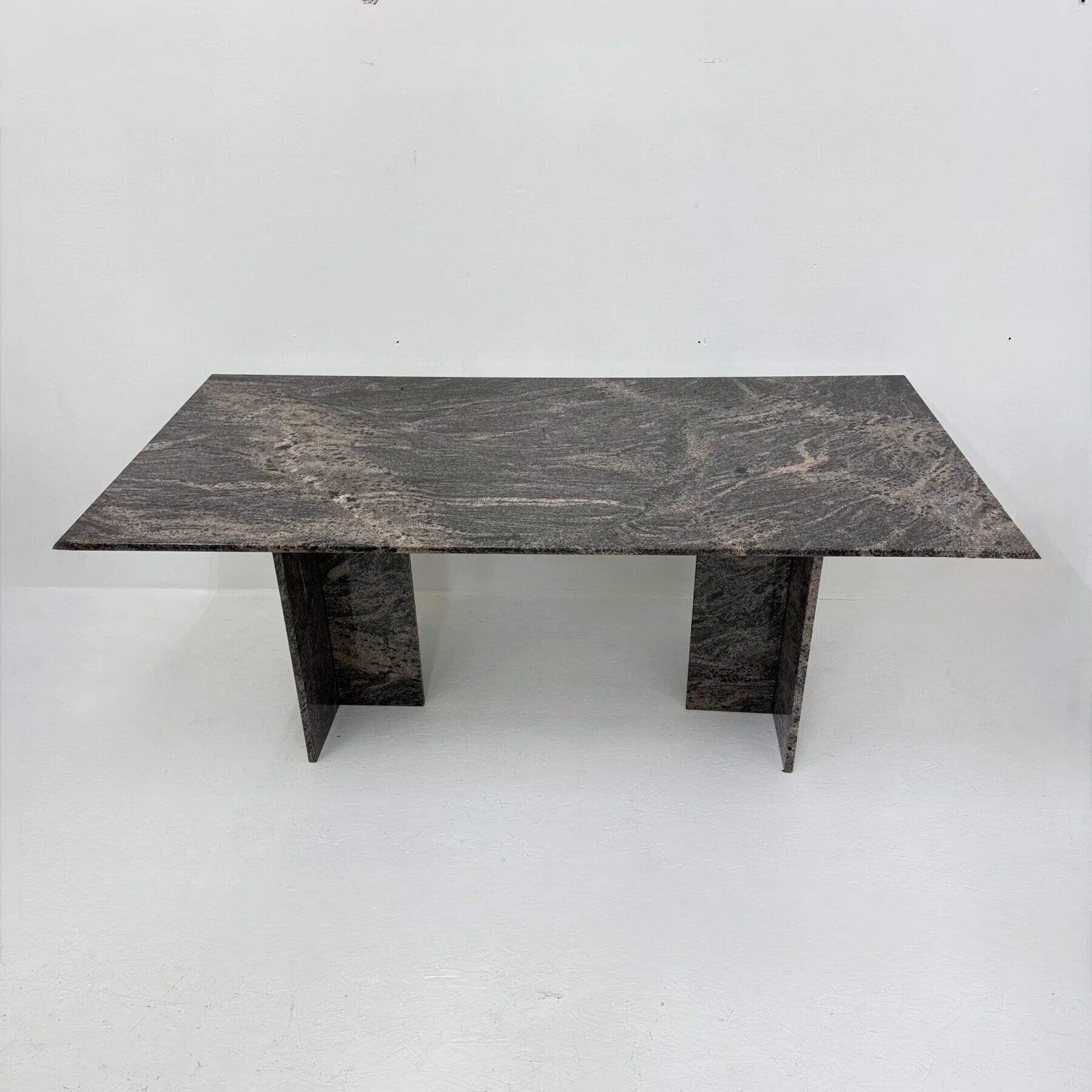 Mid-century design granite dining table, 1970shttps://nuvintage.nl/product/