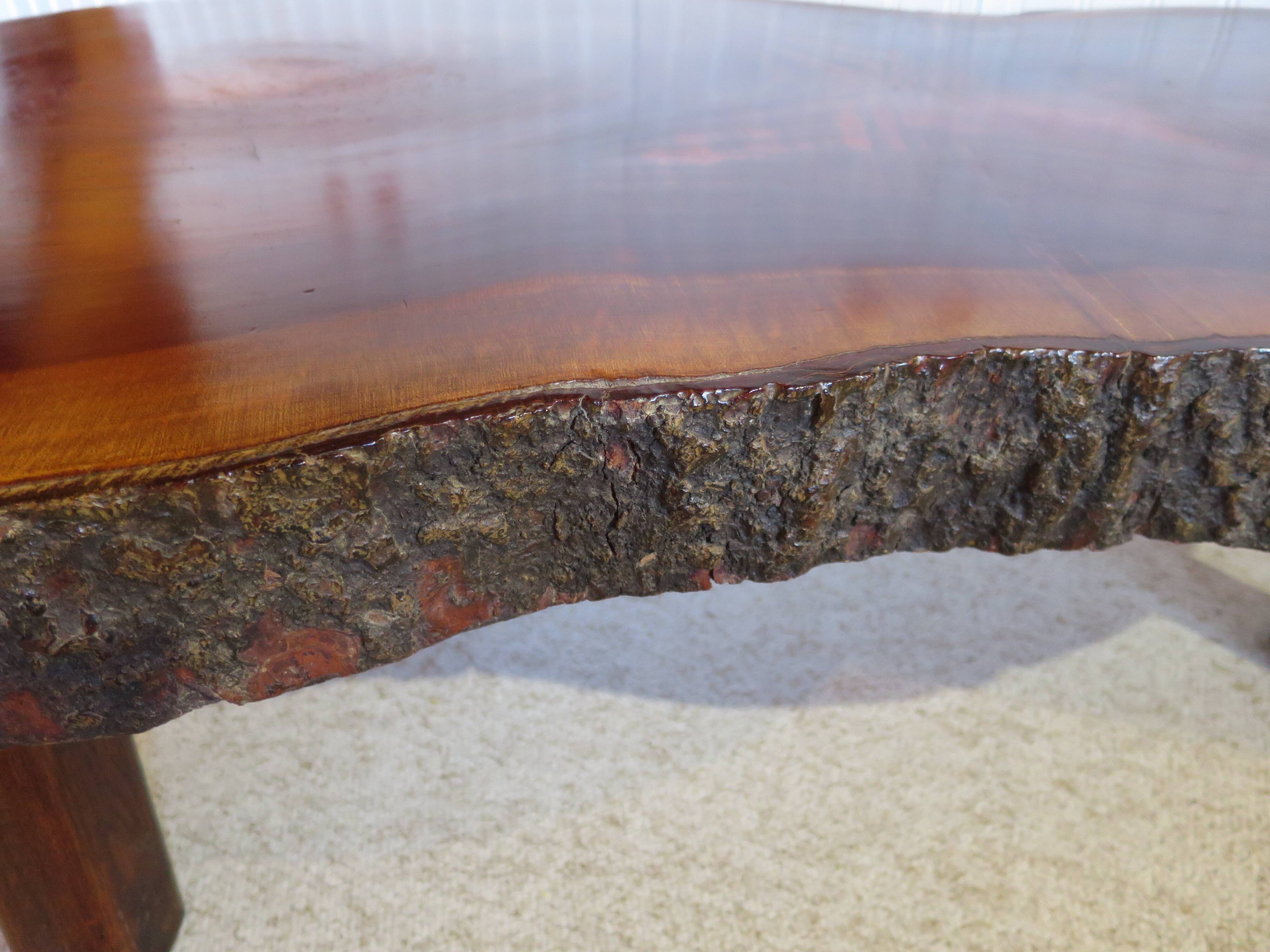 Tripod coffee table - solid okoumé wood - organic shape - brutalist style