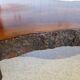 Tripod coffee table - solid okoumé wood - organic shape - brutalist style