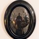Napoleon III oval frame with curved window