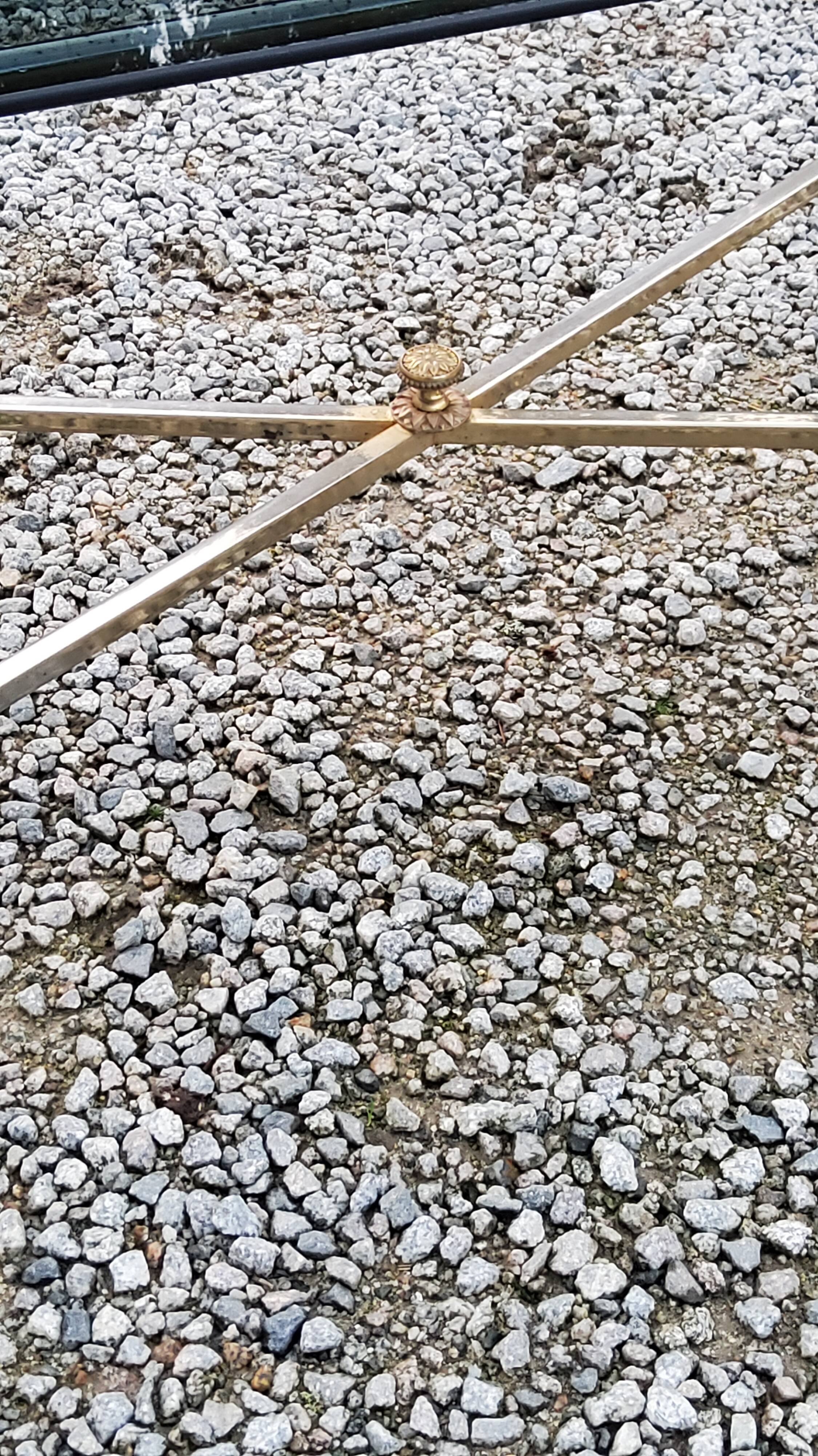 Coffee table of the 70s in neo-classical style gilded metal base and chrome smoked glass top