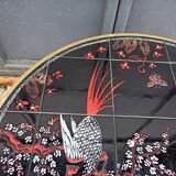 Round coffee table with Japanese bird and flower decor