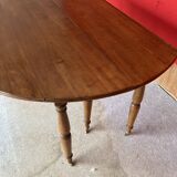 Cherry wood drop-leaf table.