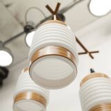 Scandinavian triangle pendant light in cascade with 3 opalines