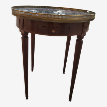 Gray marble mahogany pedestal table and brass gallery