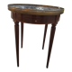 Gray marble mahogany pedestal table and brass gallery