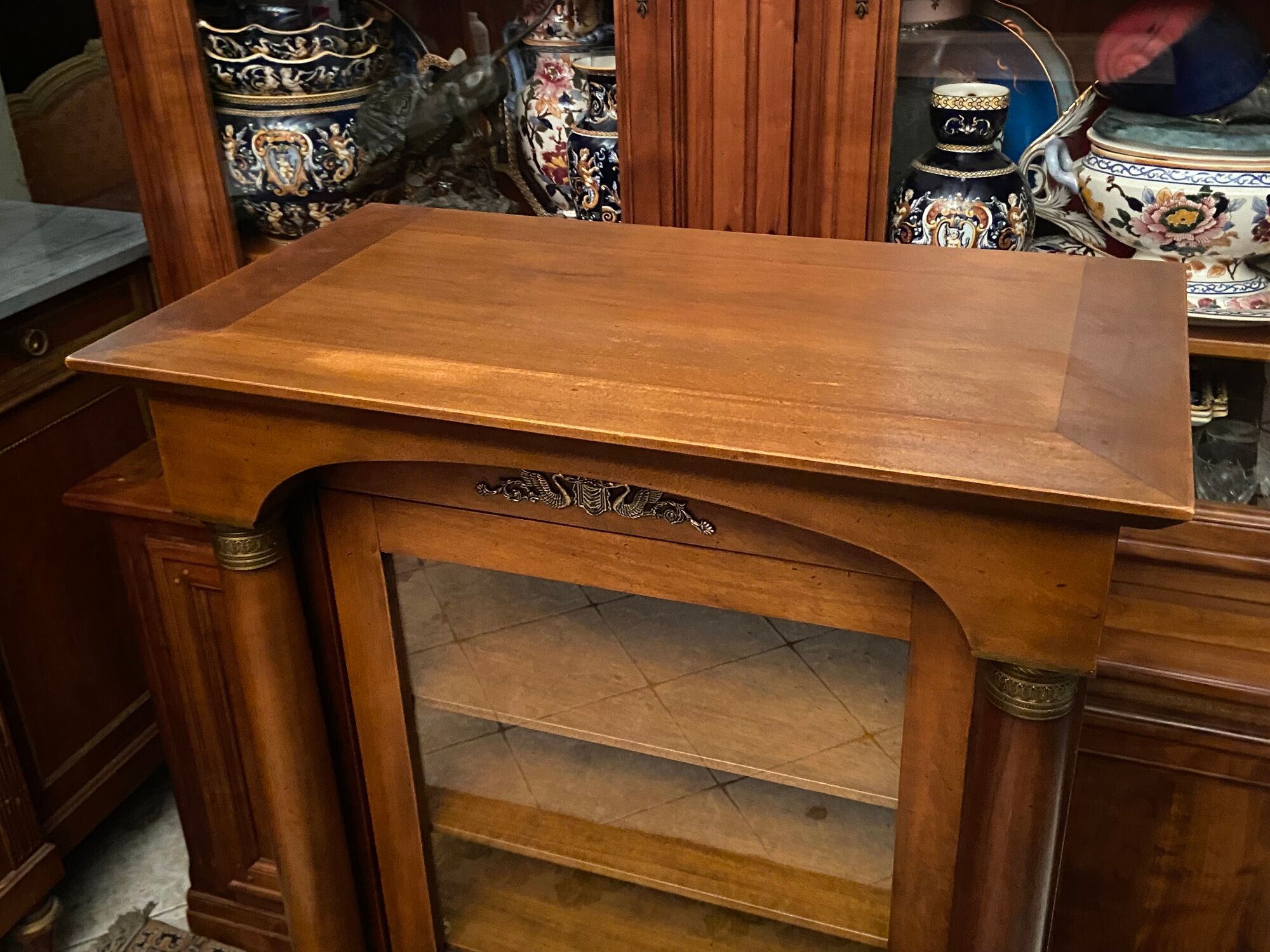 Empire style display case in cherry wood