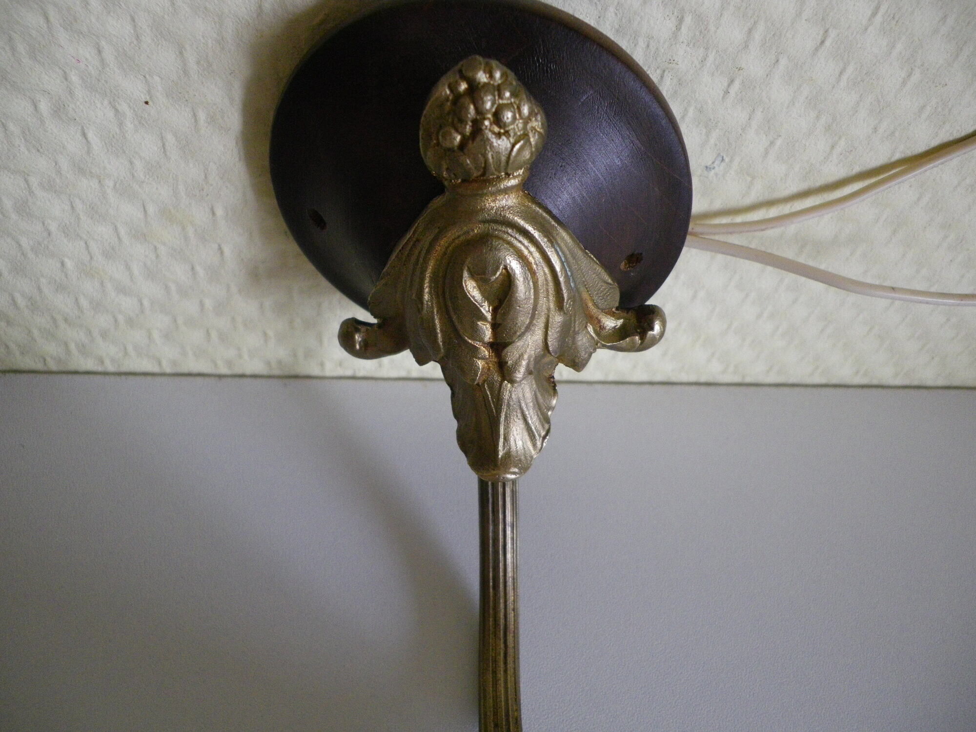 Wall lamps, opaque corolla and iridescent ochre lampshade, brass and wood support