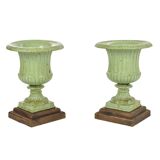 Pair of Medici cast iron vases with green patina