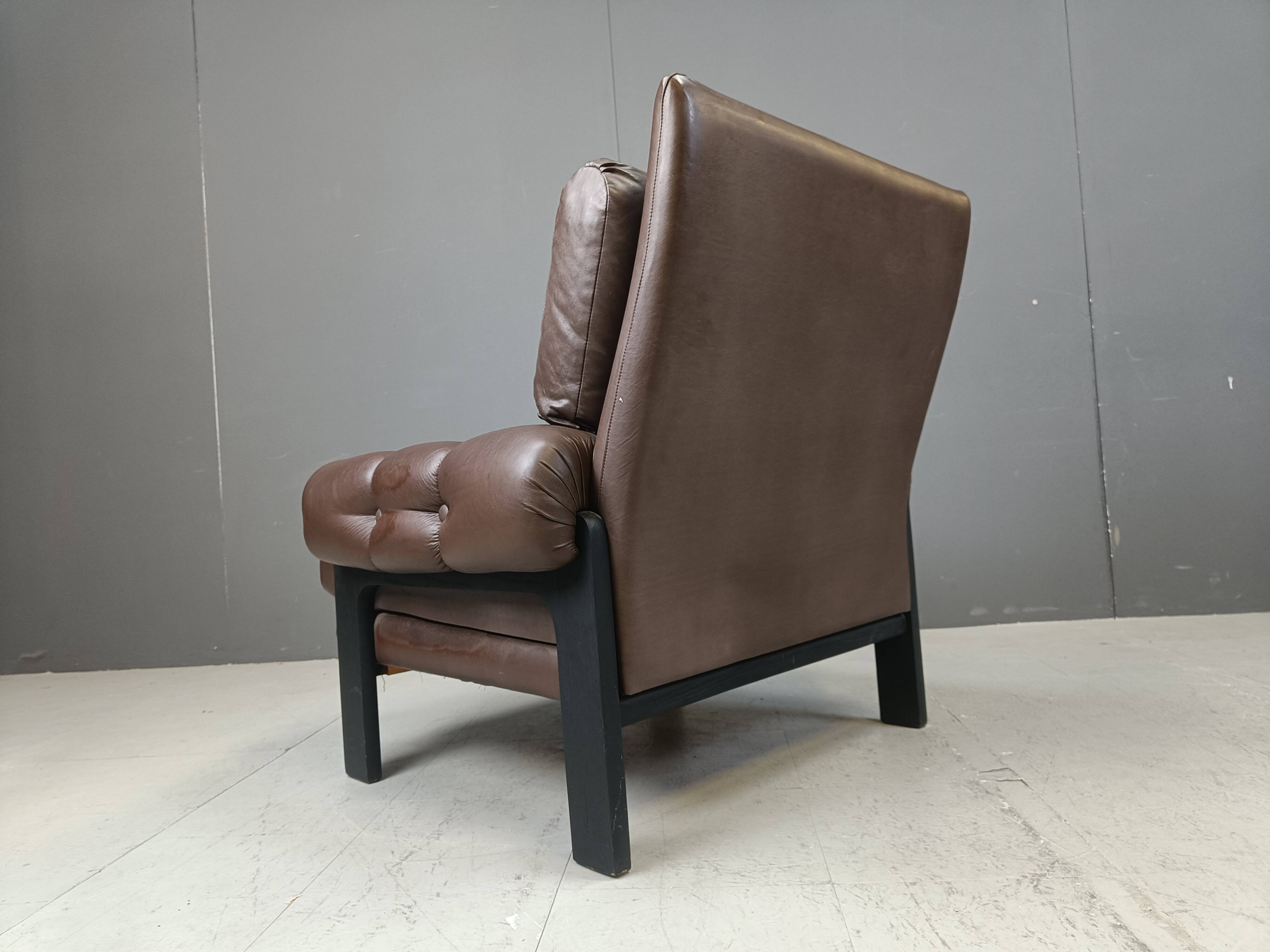 Pair of leather armchairs made in Denmark, 1960s