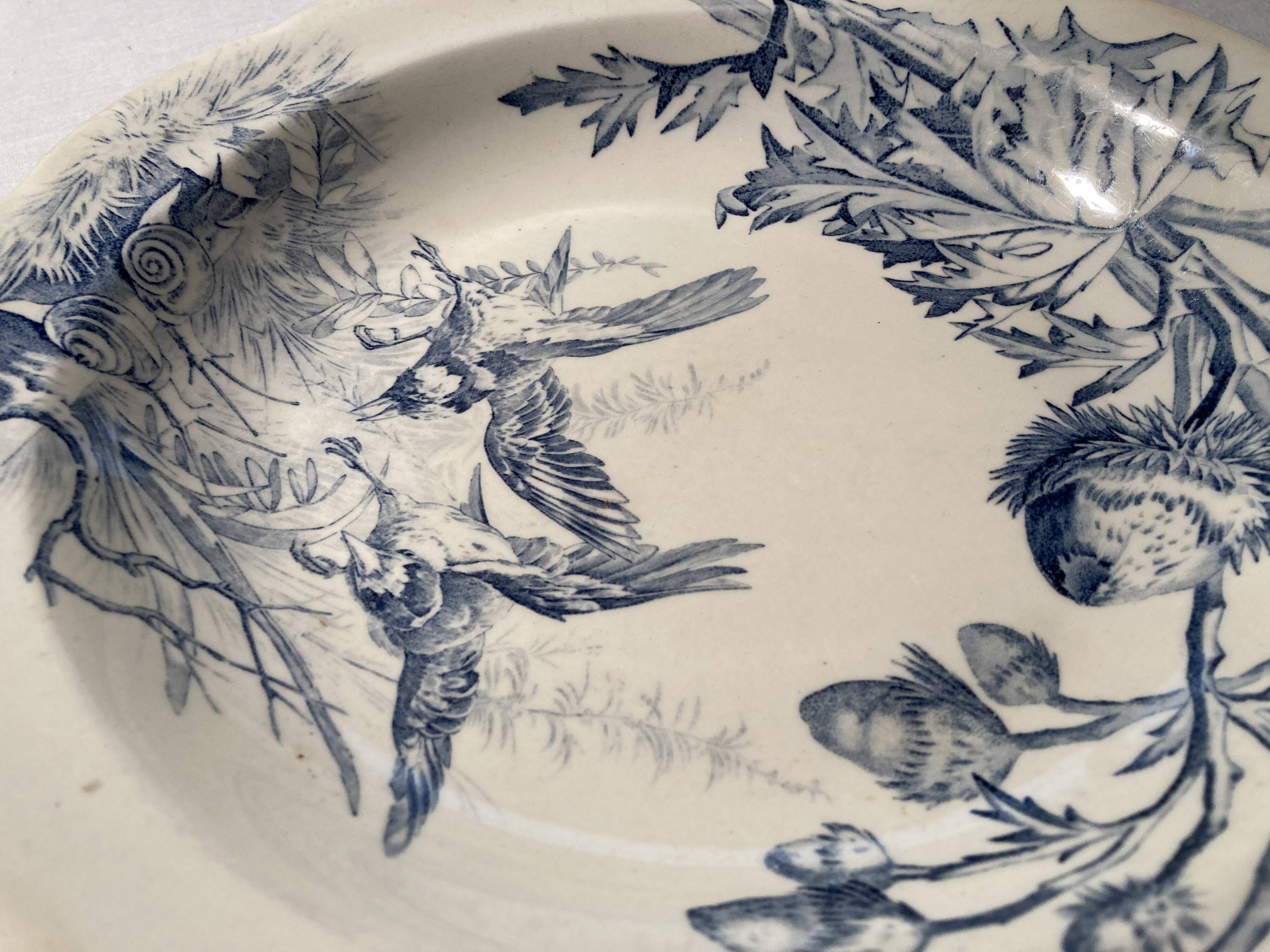 Plat rond en terre de fer, Clairefontaine, modèle Chardon, fin XIXe