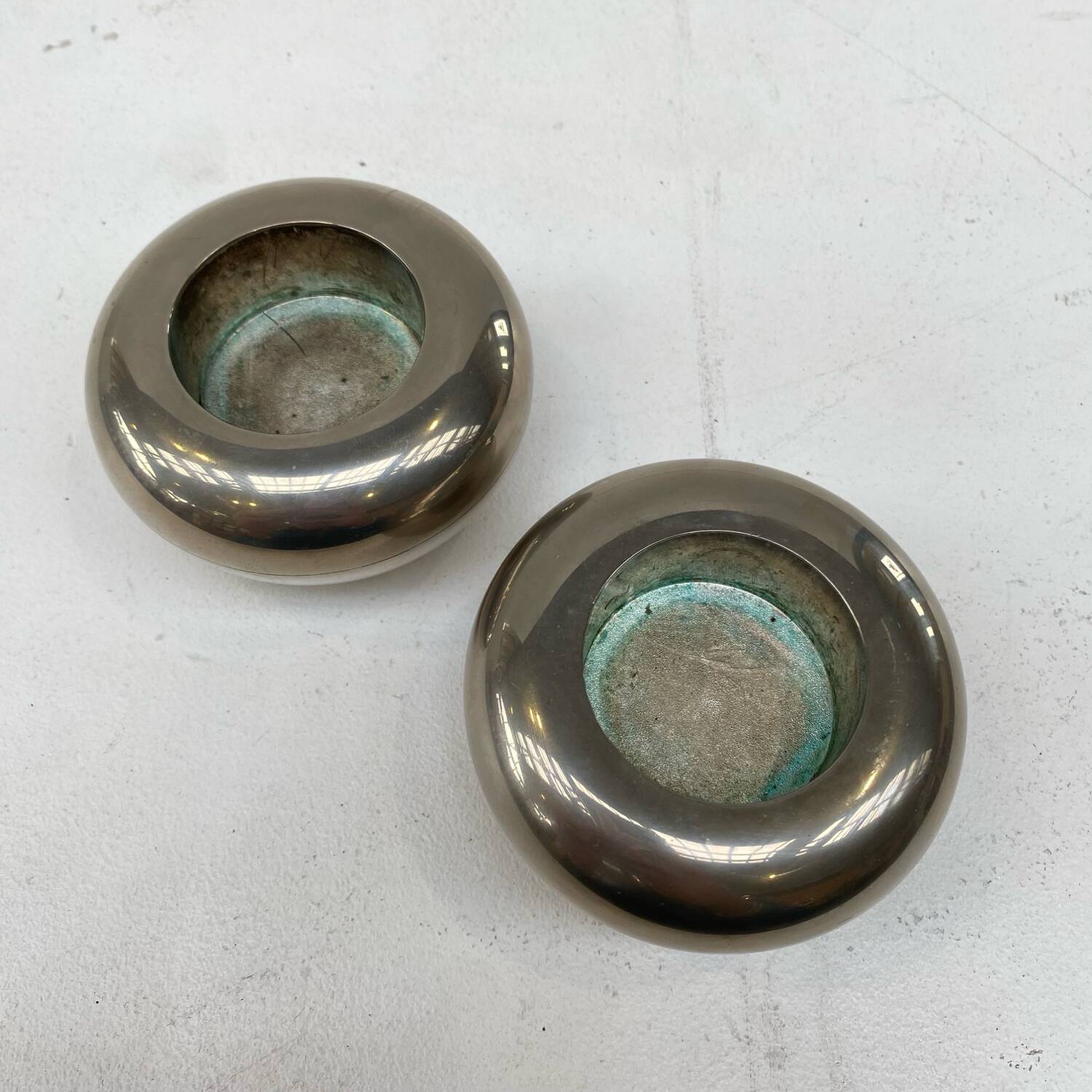 Set of two silver metal candlesticks from the 70s