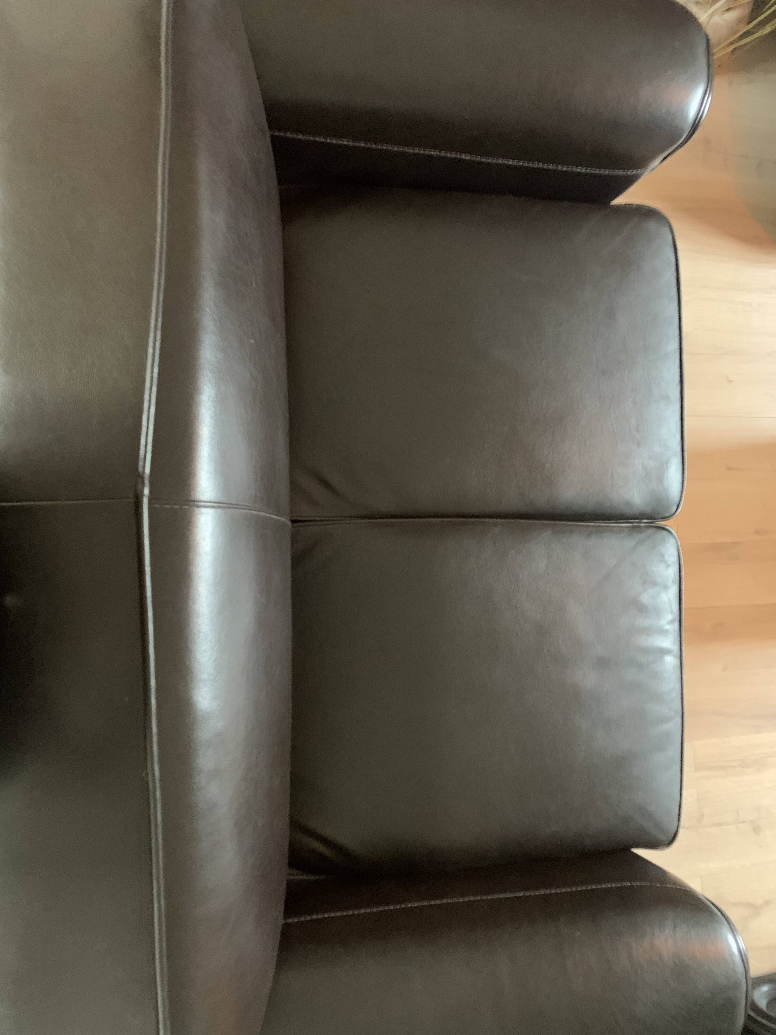 Brown leather club sofa