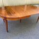 Round extendable dining table Louis XVI in cherry wood from the 1960s.