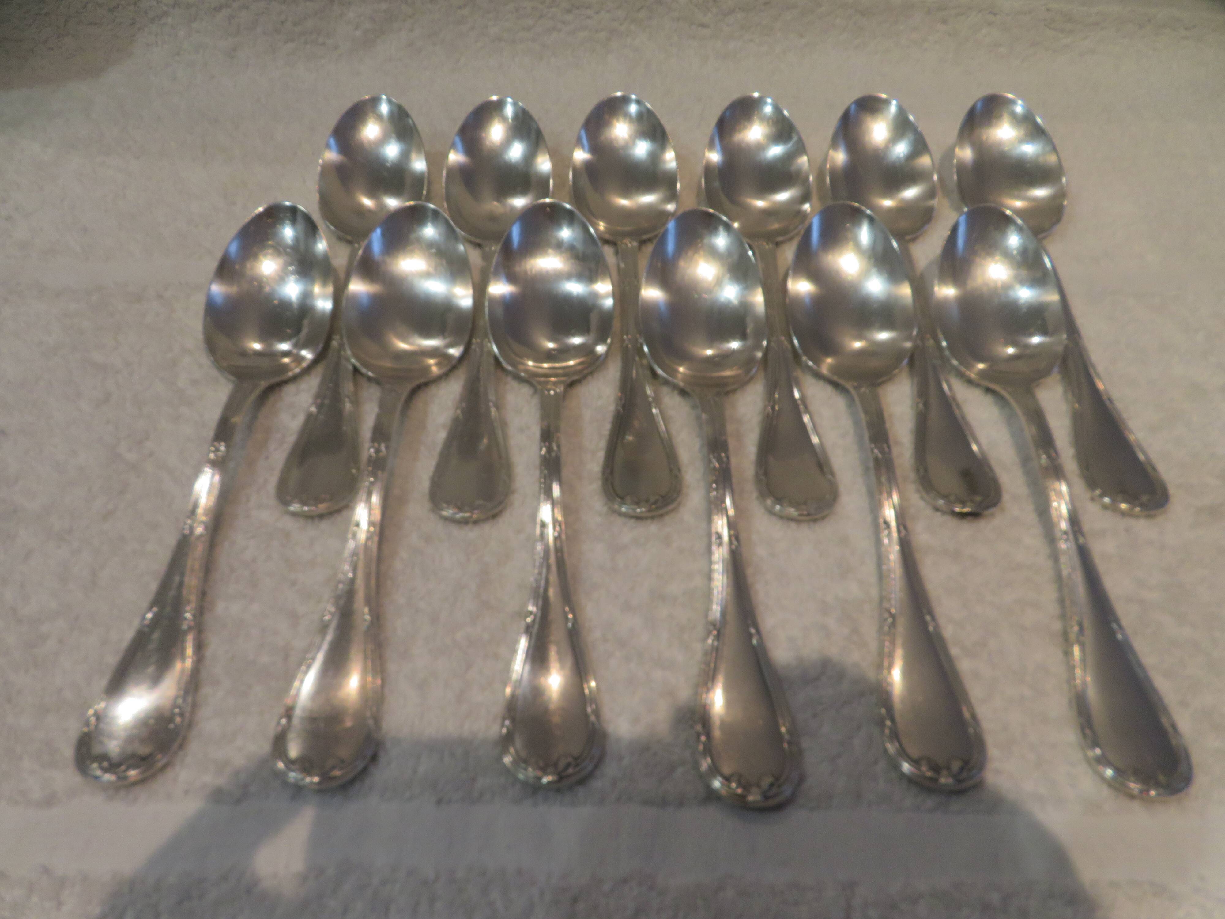 12 silver plated soup spoons by Christofle with Louis XVI ribbons