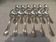 12 silver plated soup spoons by Christofle with Louis XVI ribbons