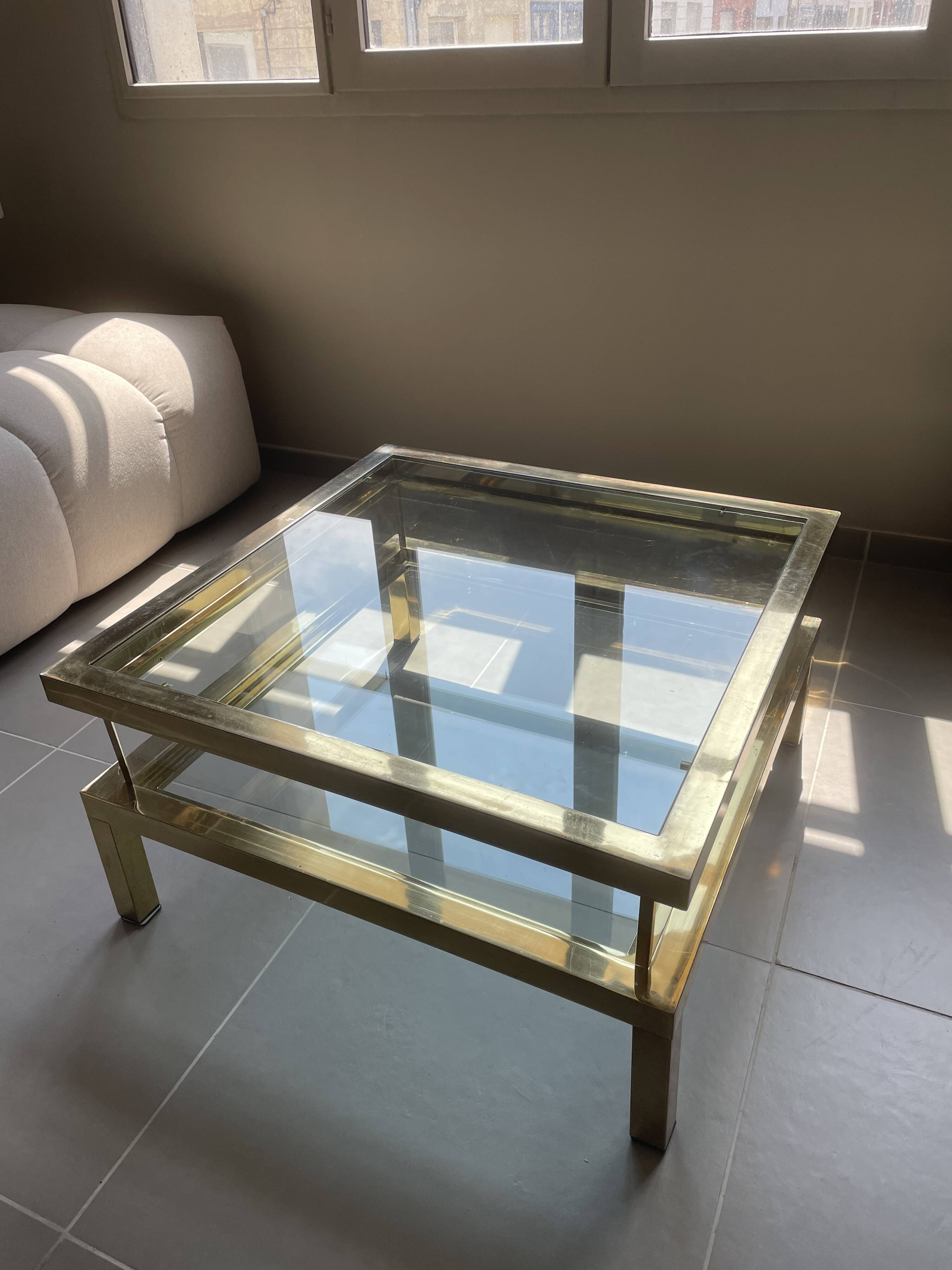 Vintage 1970s coffee table brass chrome Maison Jansen style with a top cover.