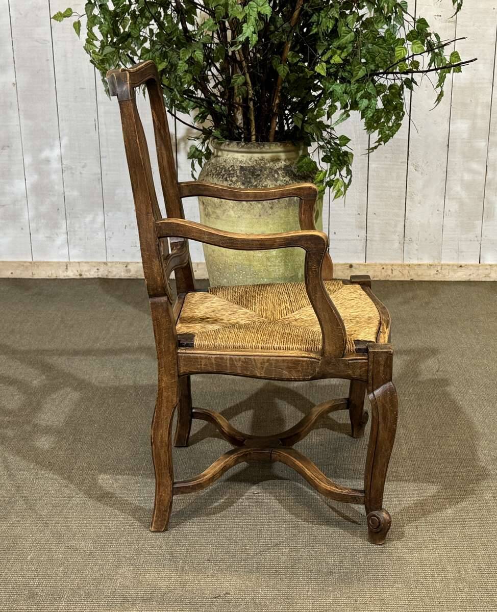 20th-century armchair in beech with a straw seat in Louis XV style.